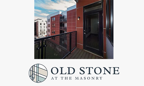 Old Stone a logo with a balcony photo