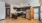 a kitchen with black cabinets
