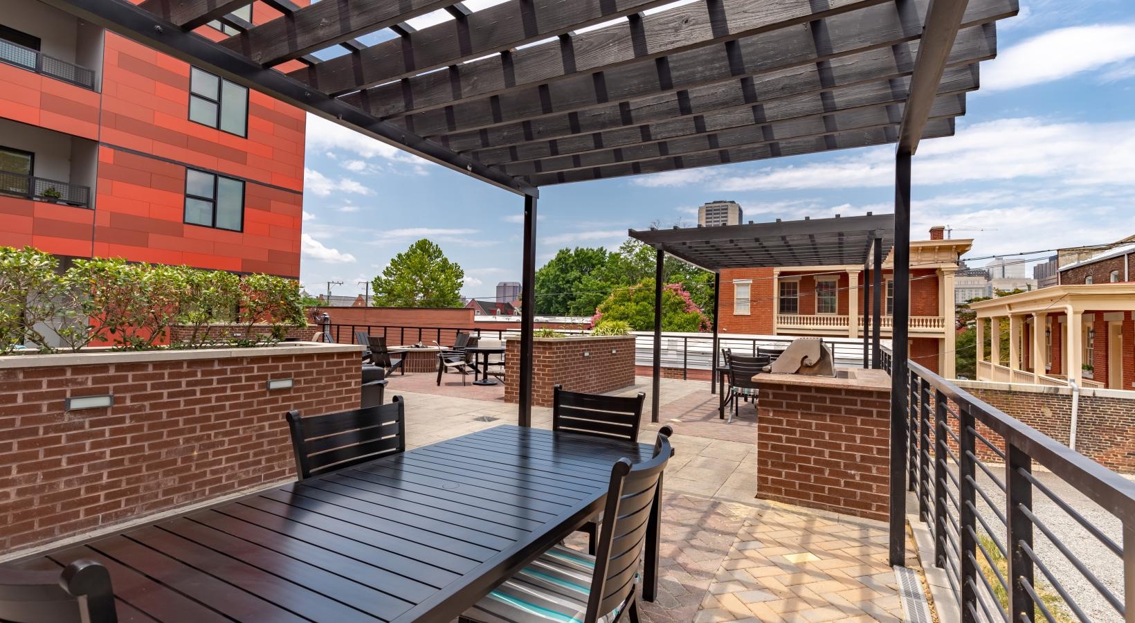 Everything within reach a patio with a table and chairs