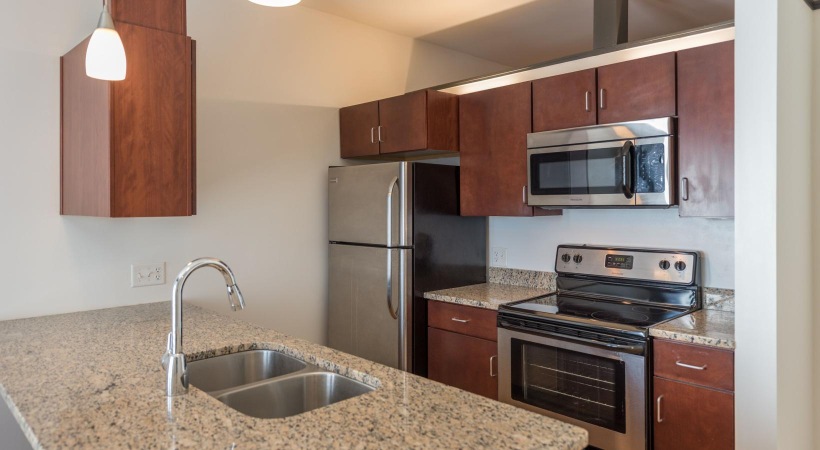 a kitchen with stainless steel appliances