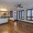 living room with wood floors and several windows