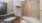 a bathroom with a marble countertop