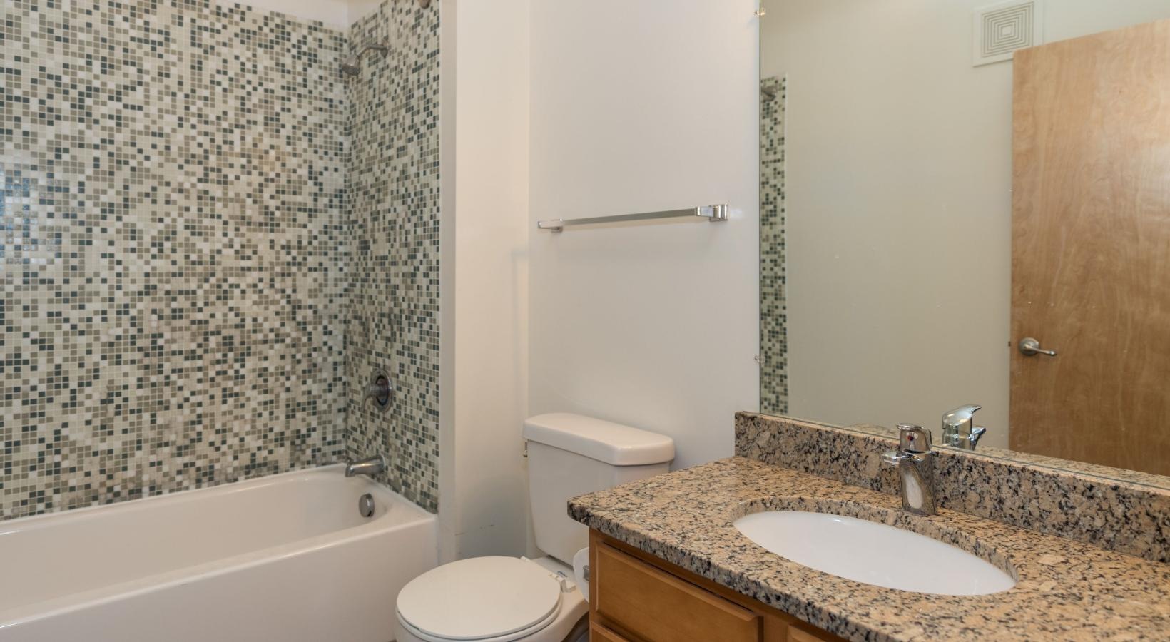 Spacious bathrooms with everything you need a bathroom with a marble countertop