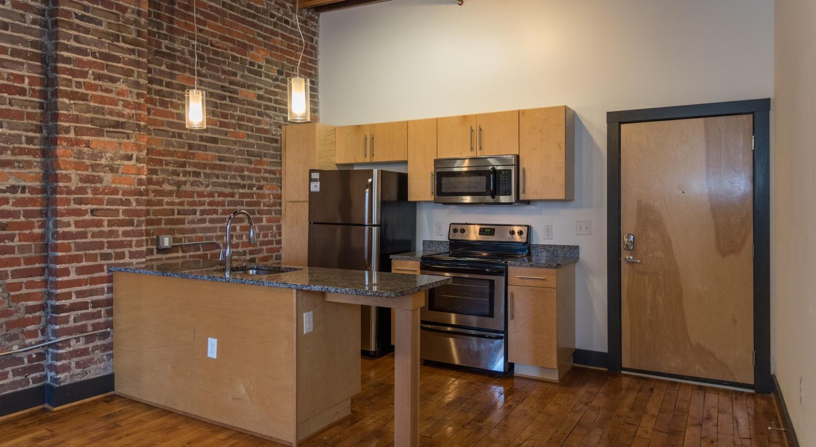 Beautiful kitchens with designer finishes a kitchen with stainless steel appliances