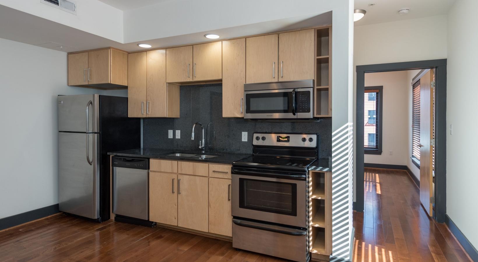 Beautiful kitchens with designer finishes a kitchen with wooden cabinets